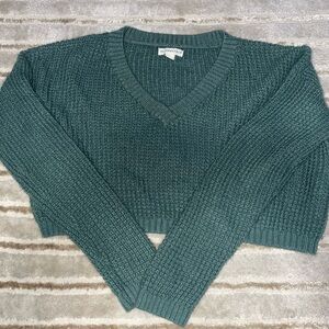 dark green sweater
